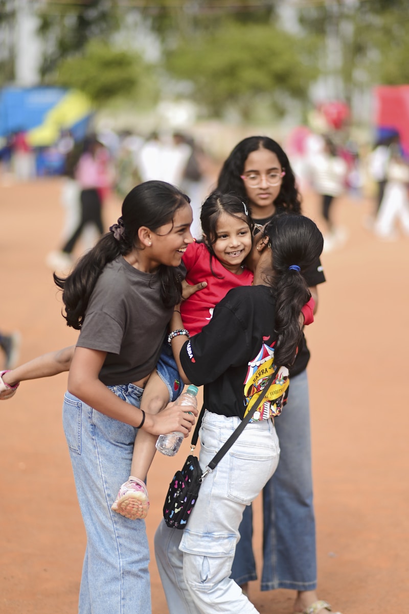 Diverse women and children supporting each other