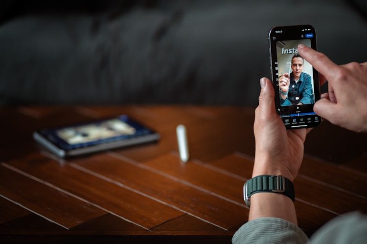 Person holding smartphone showing a video call interface while testing the best international calling app from Seattle