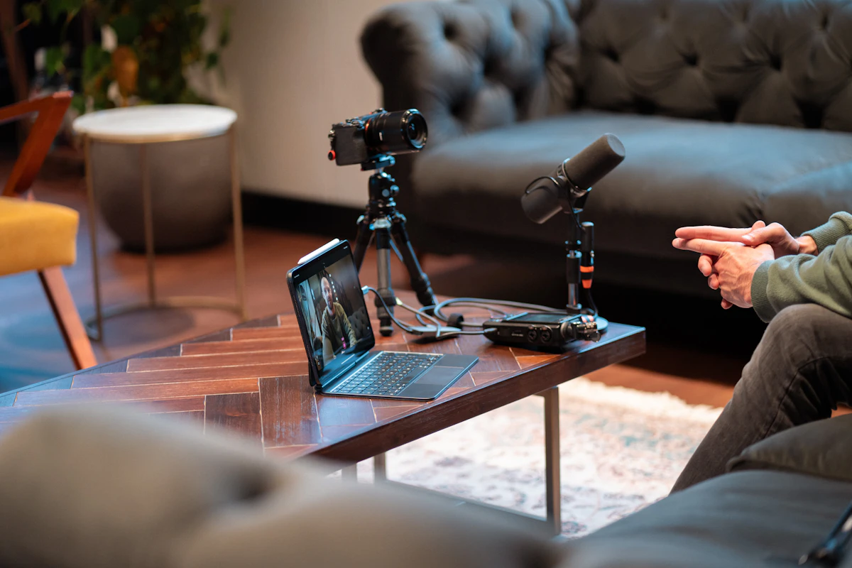 Video creator filming content with camera and microphone
