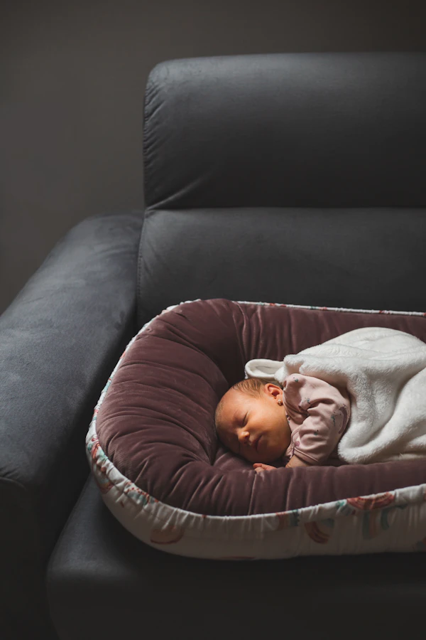 Newborn baby sleeping peacefully at night