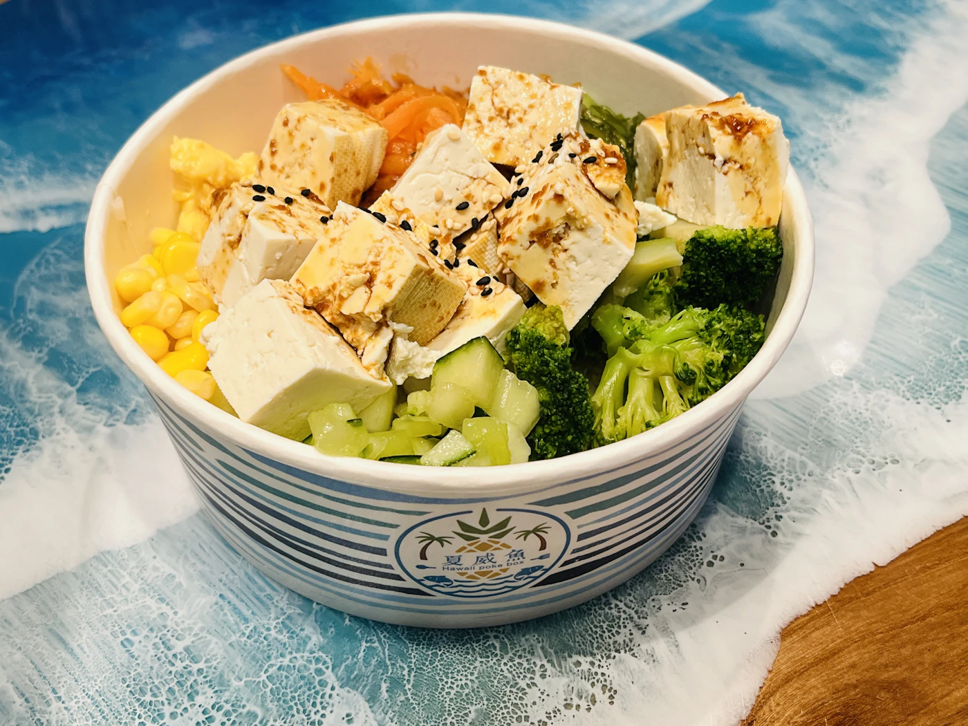 Tofu broccoli corn and vegetable bowl with sesame dressing