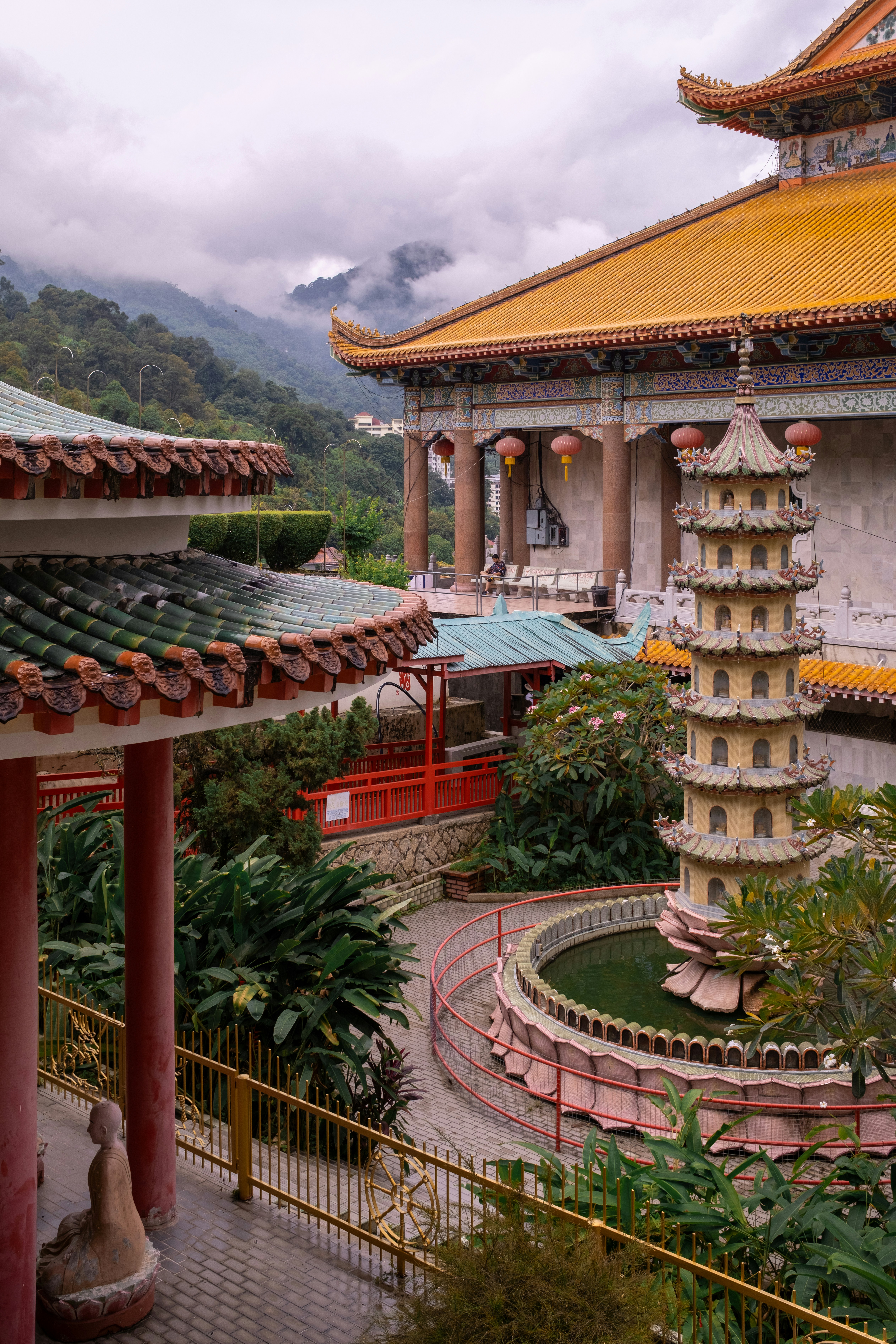 Pagoda and temple buildings amidst lush greenery