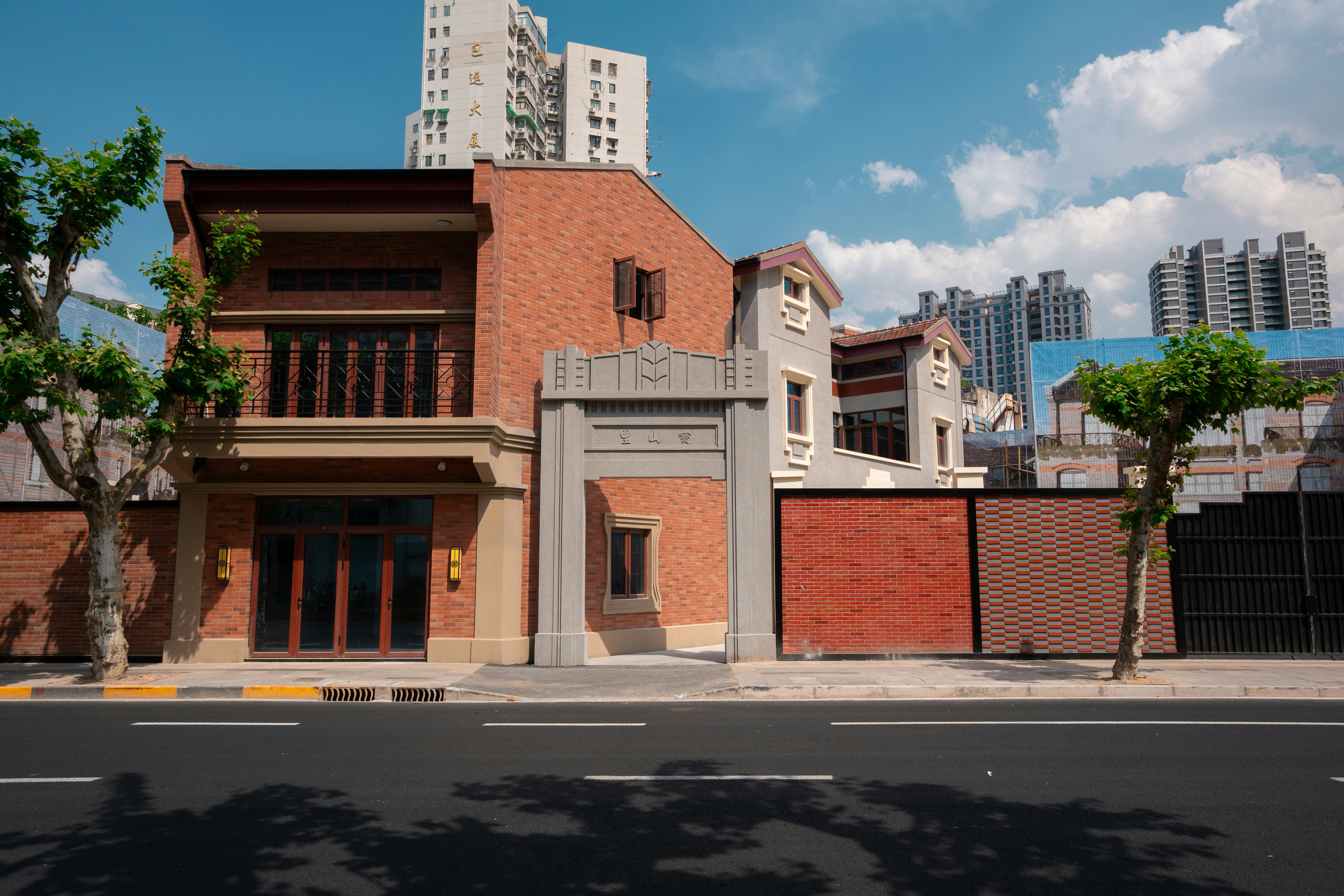 Brick buildings with an archway on a sunny day