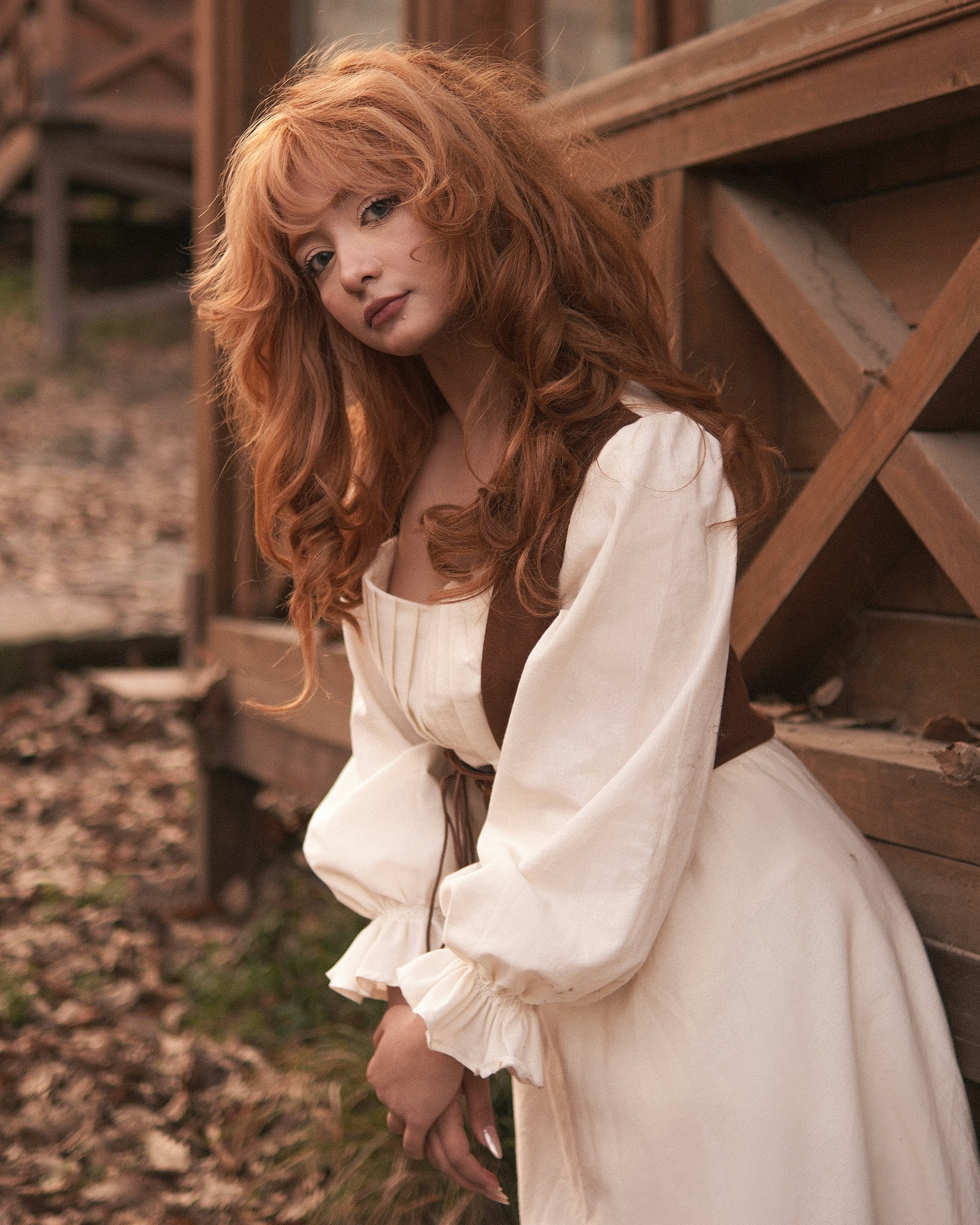 Young woman with long red hair and freckles