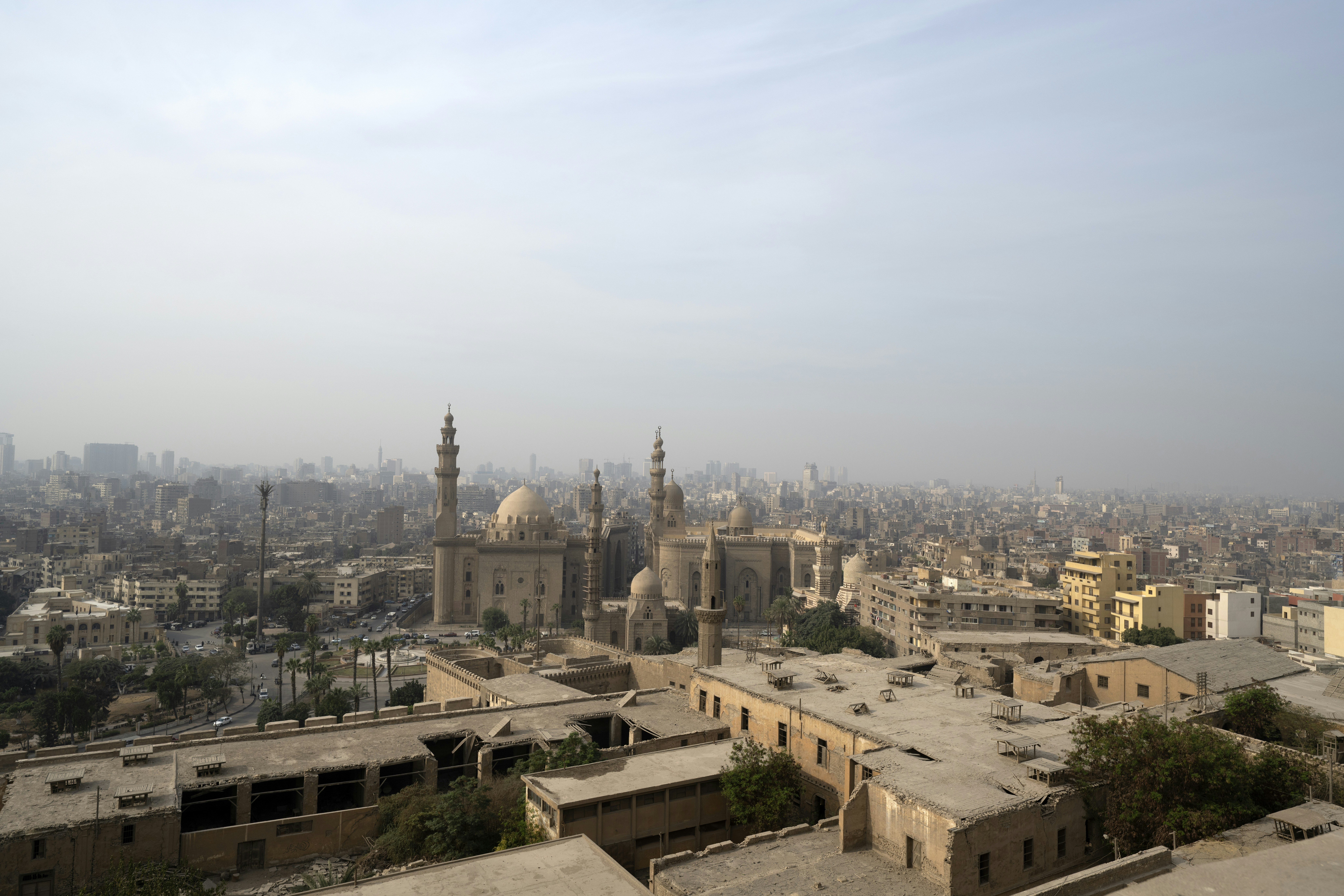 Panoramic view of a sprawling city with mosques and mosques.