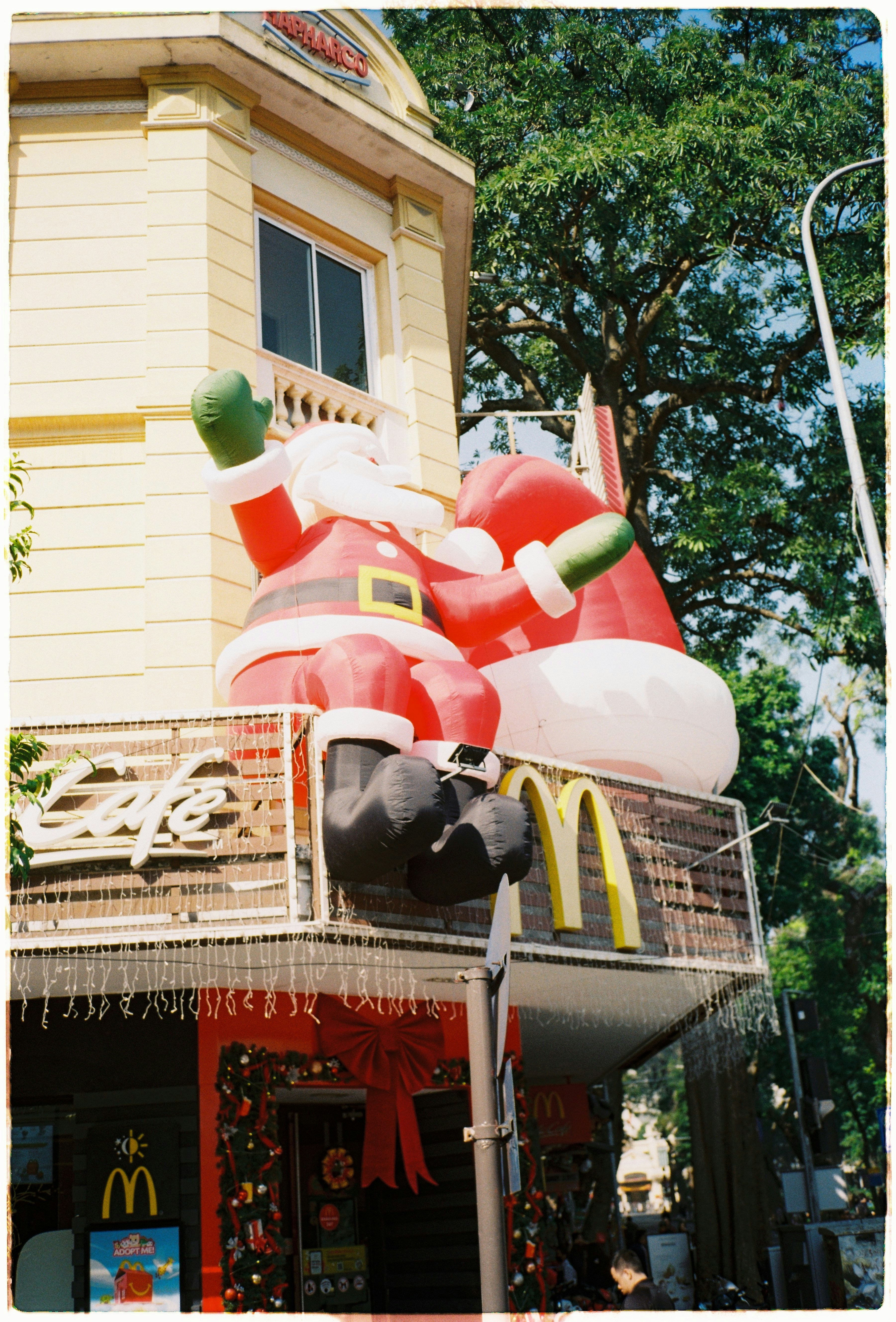Giant inflatable santa claus decoration on building