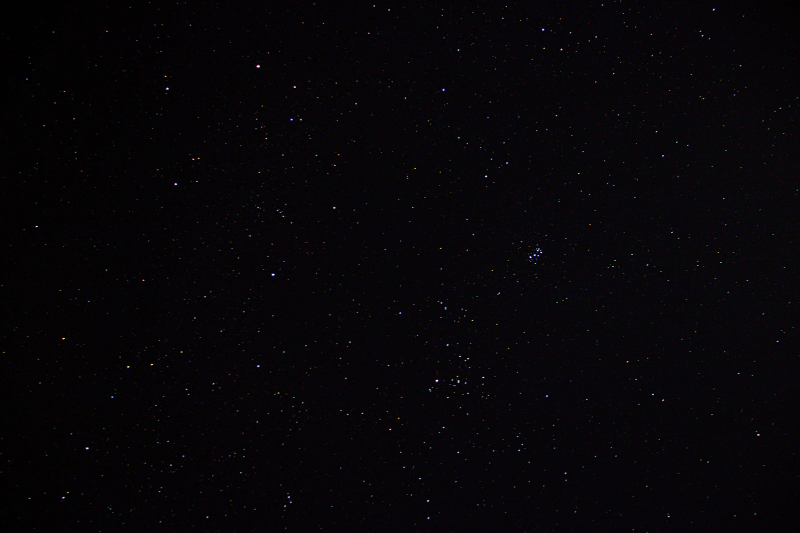 Starry galaxy nebula with swirling blues, purples, soft white light suggesting infinite possibility