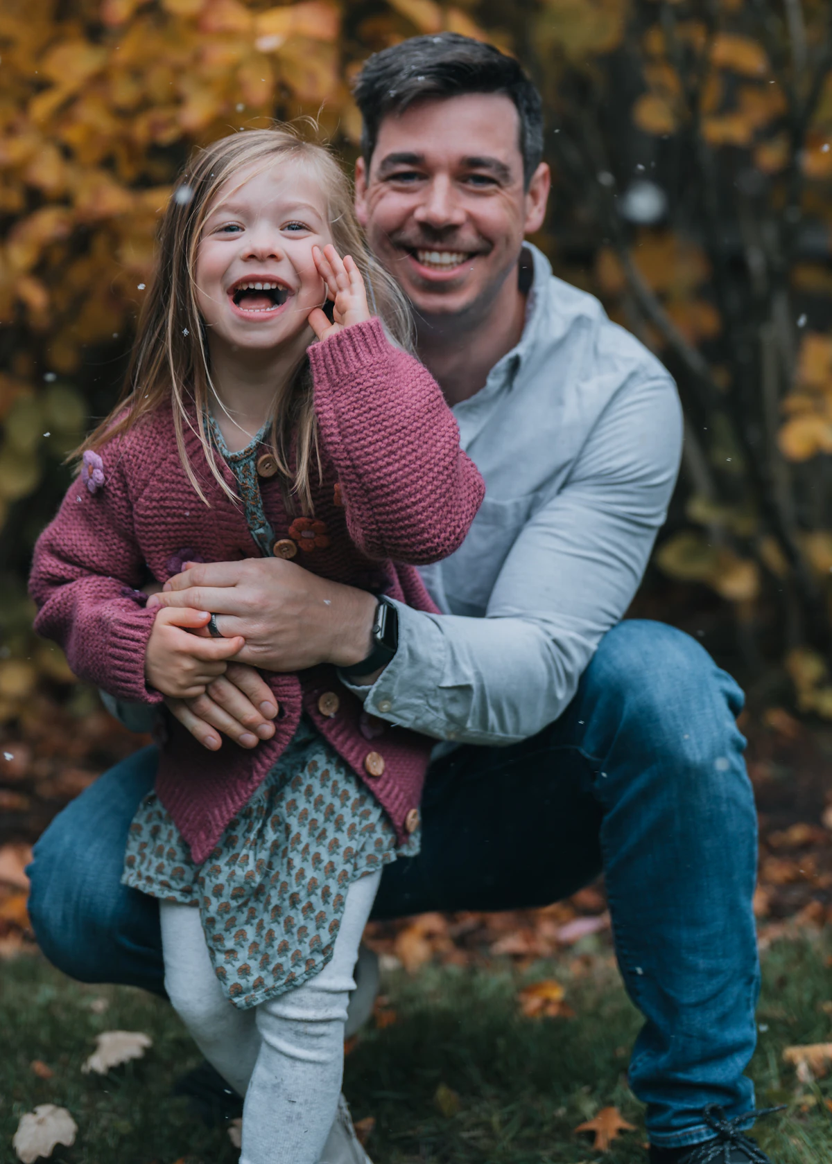 Father and daughter in an autumn portrait