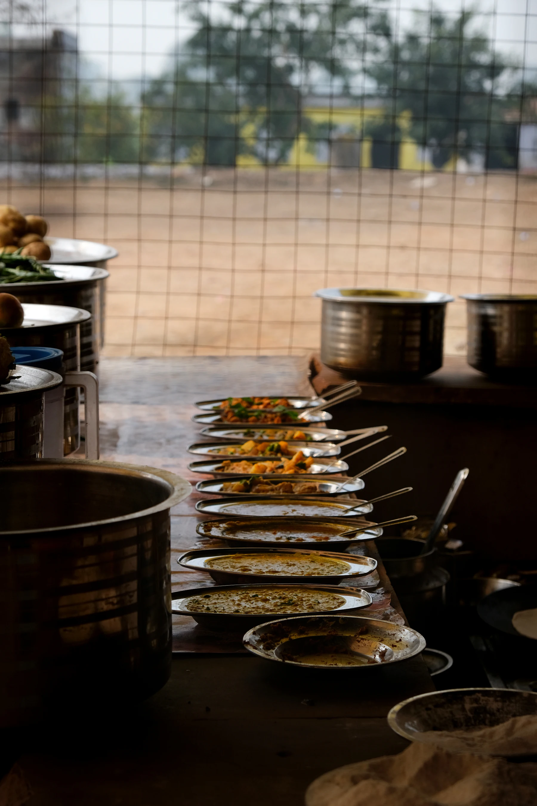 A street food stall with dishes on display