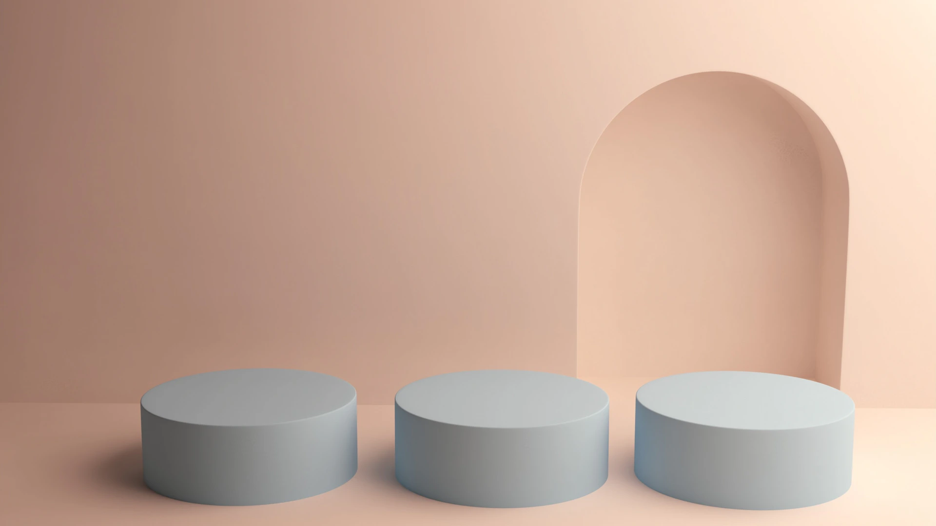 Three light blue pedestals in front of arched doorway.