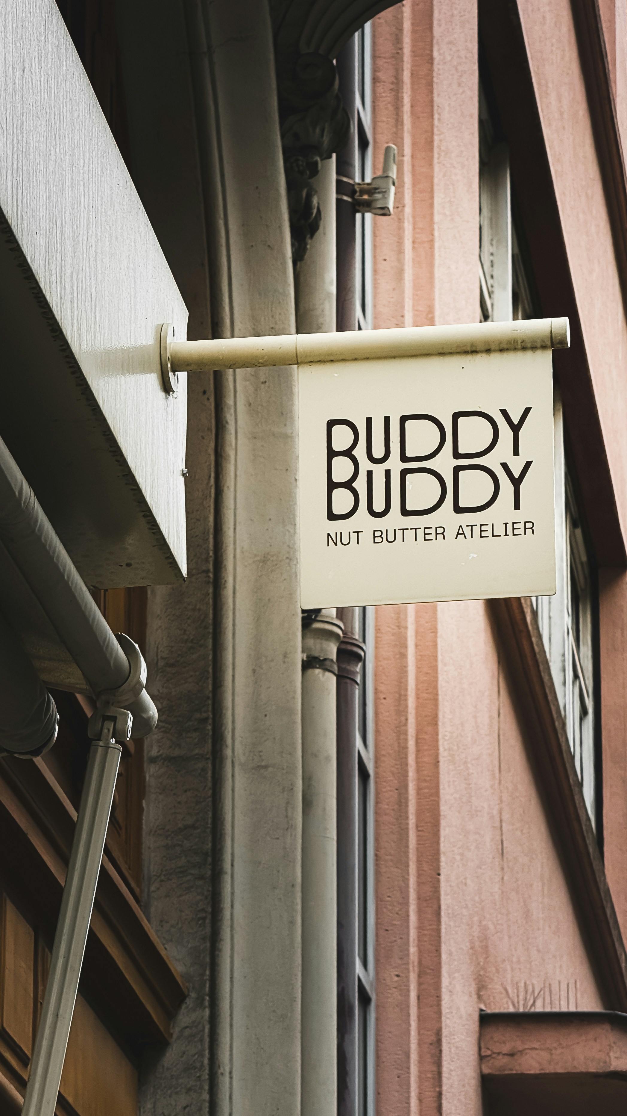 Buddy buddy nut butter atelier store sign
