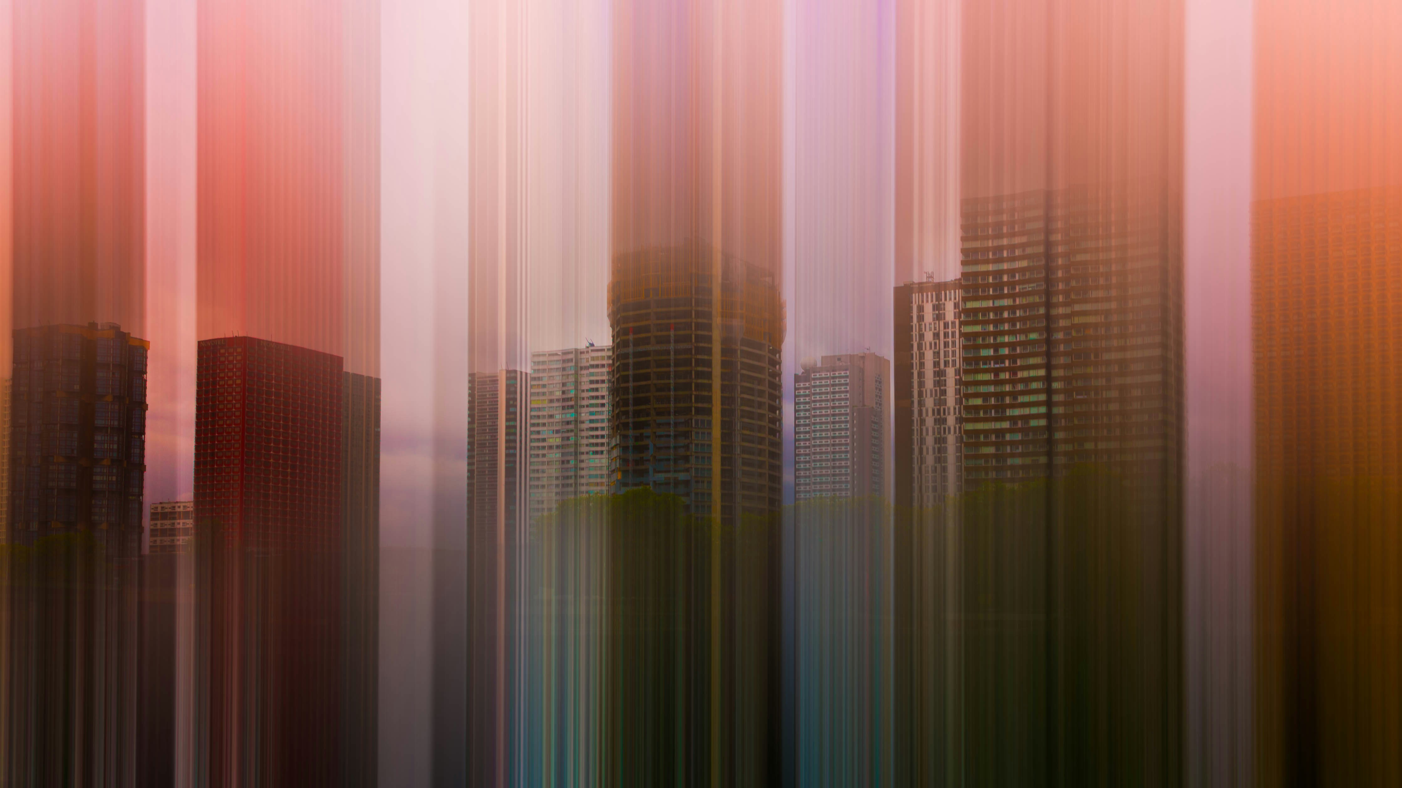 Abstract vertical lines with city skyline silhouette
