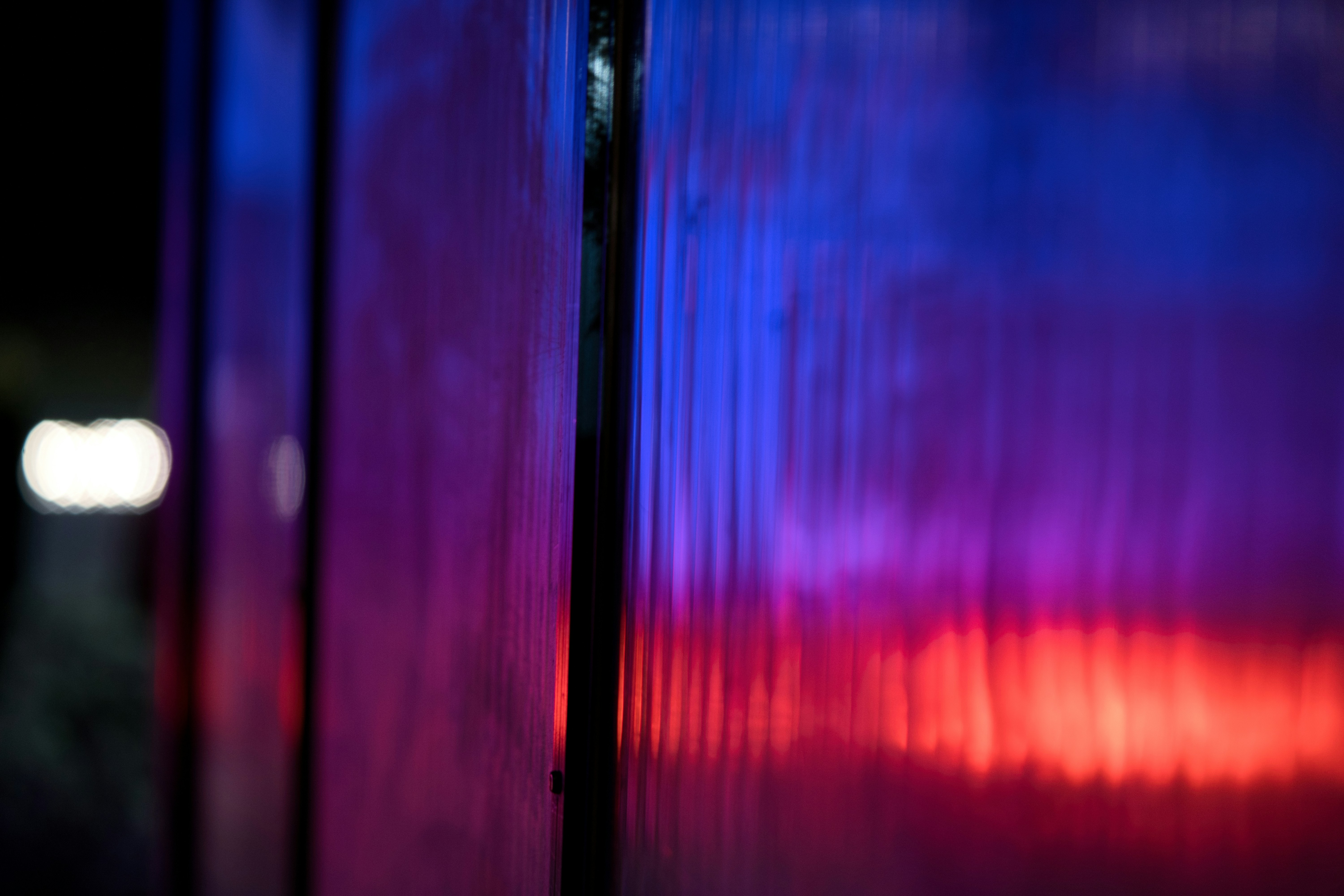 Abstract blue and red lights on textured surface