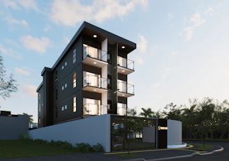 Modern apartment building with balconies and large windows.