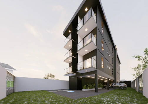 Modern apartment building with balconies and parking area