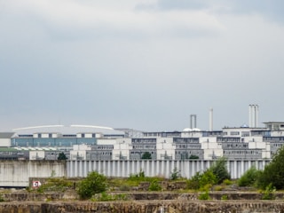 Industrial buildings under a cloudy sky