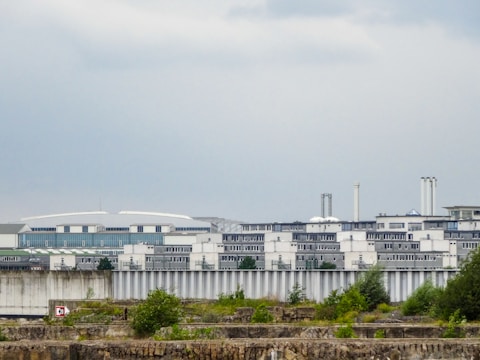 Industrial buildings under a cloudy sky