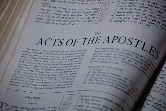 The acts of the apostles book title on a page.