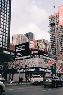 City street with buildings and a healthy planet store.