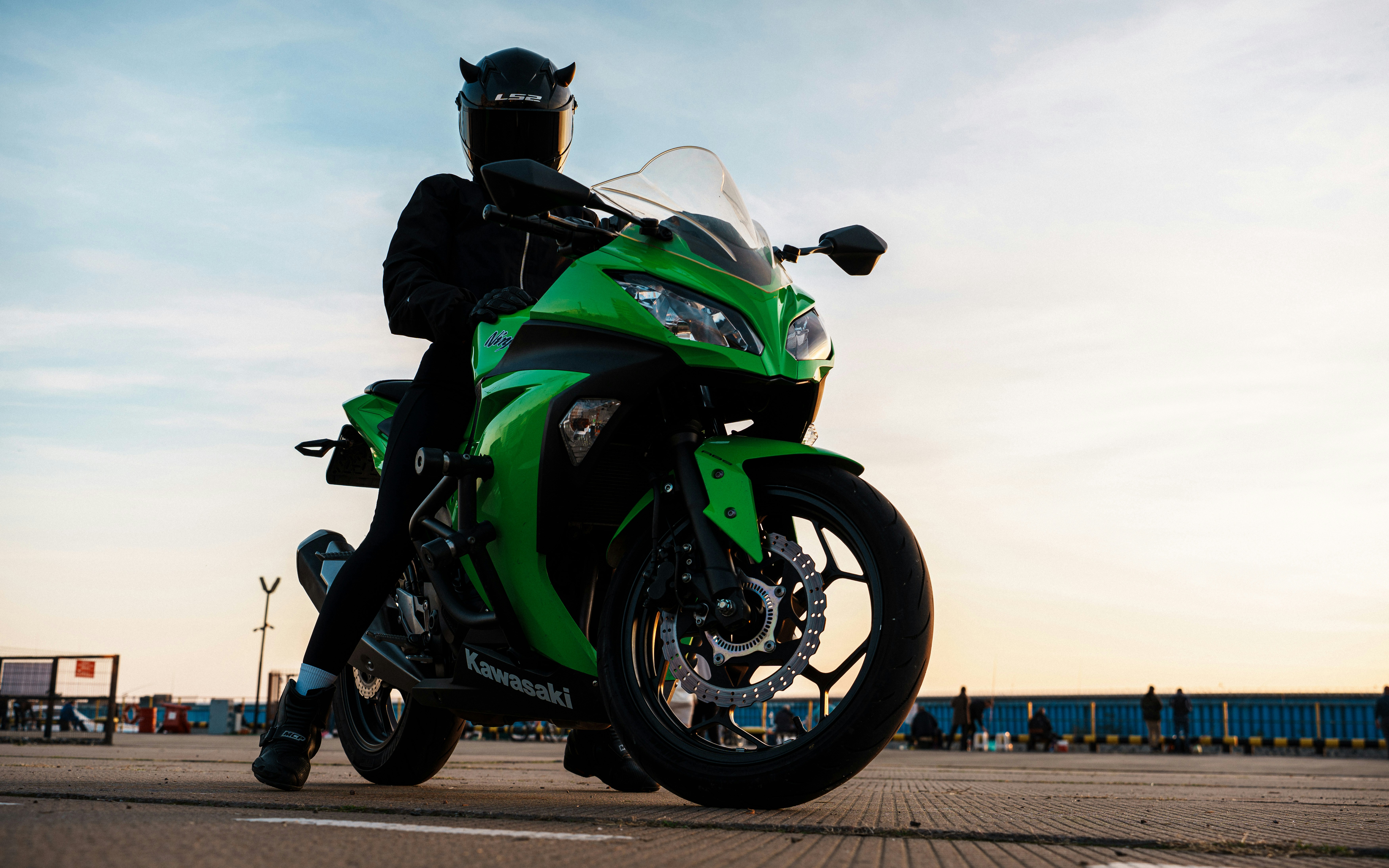Rider on green motorcycle