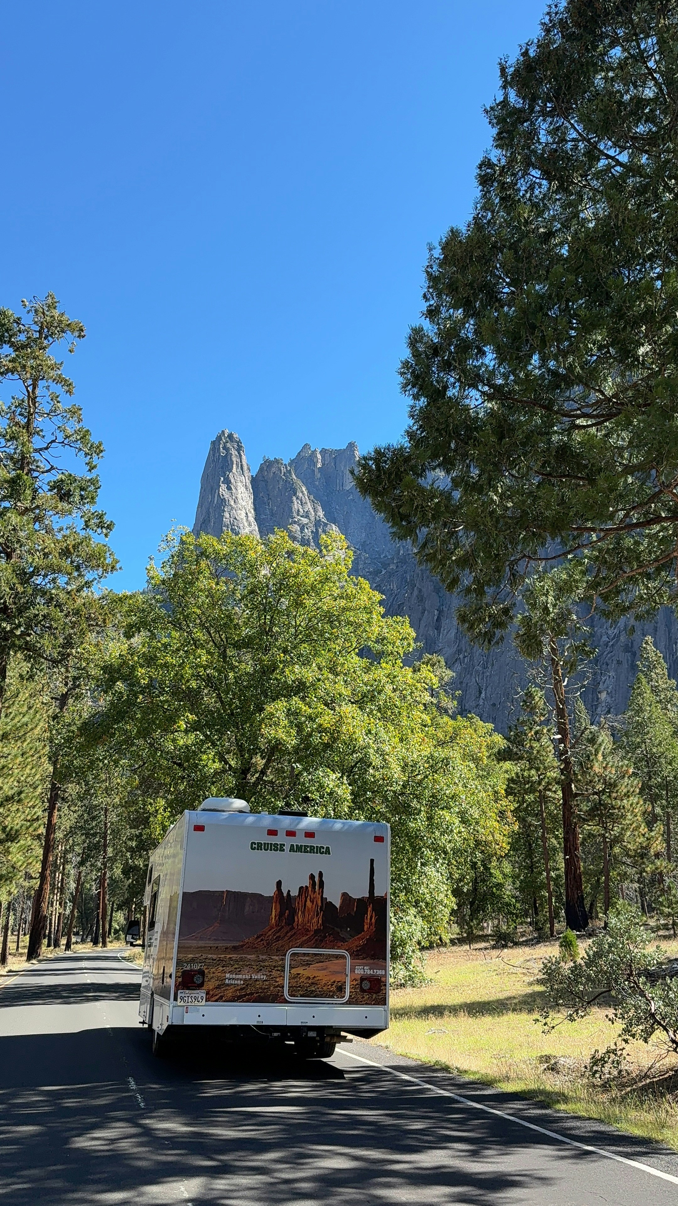 Rv driving on a road towards mountains