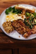 Plate of food with chicken and vegetables