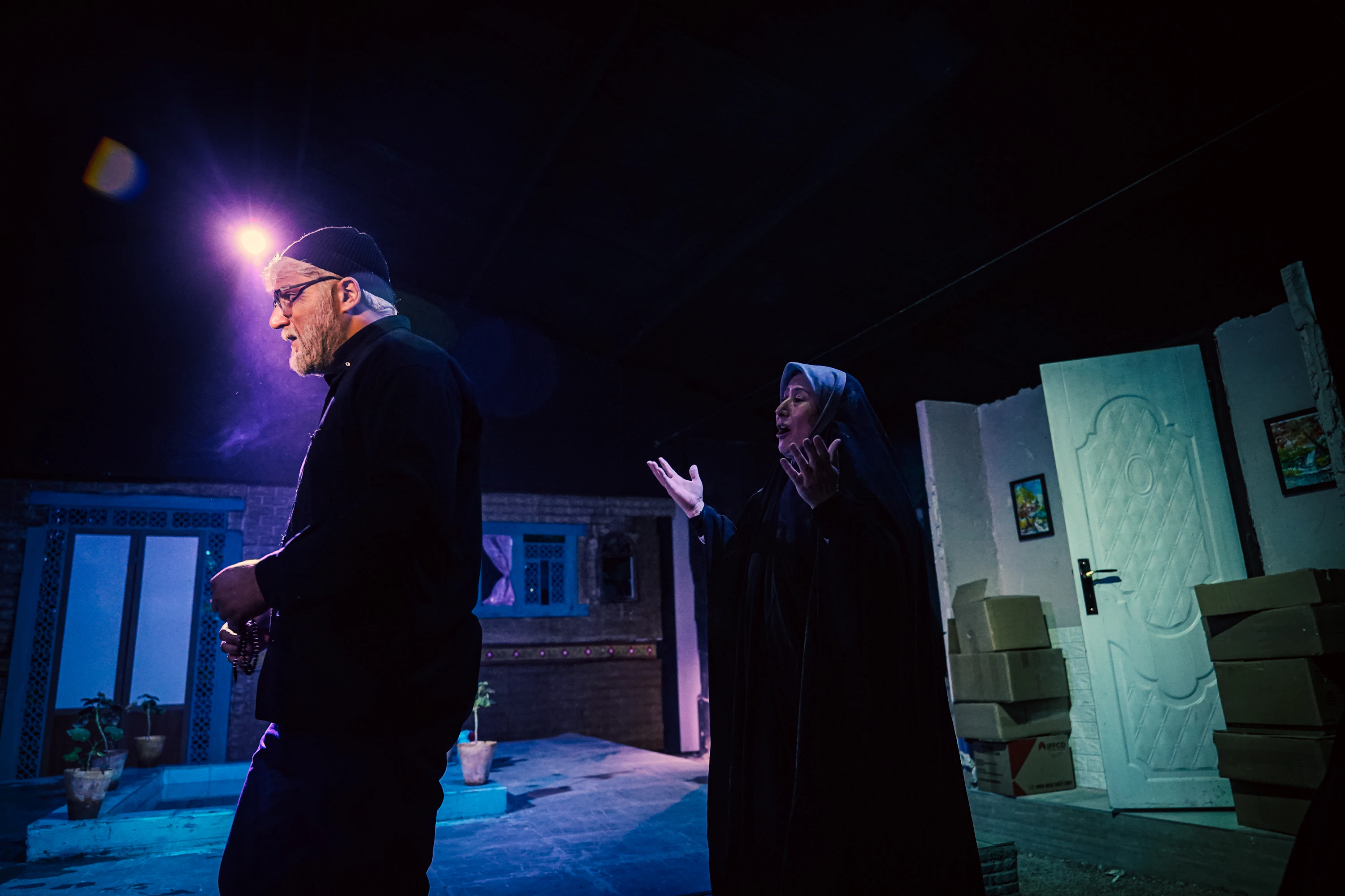Actors performing among scenic elements