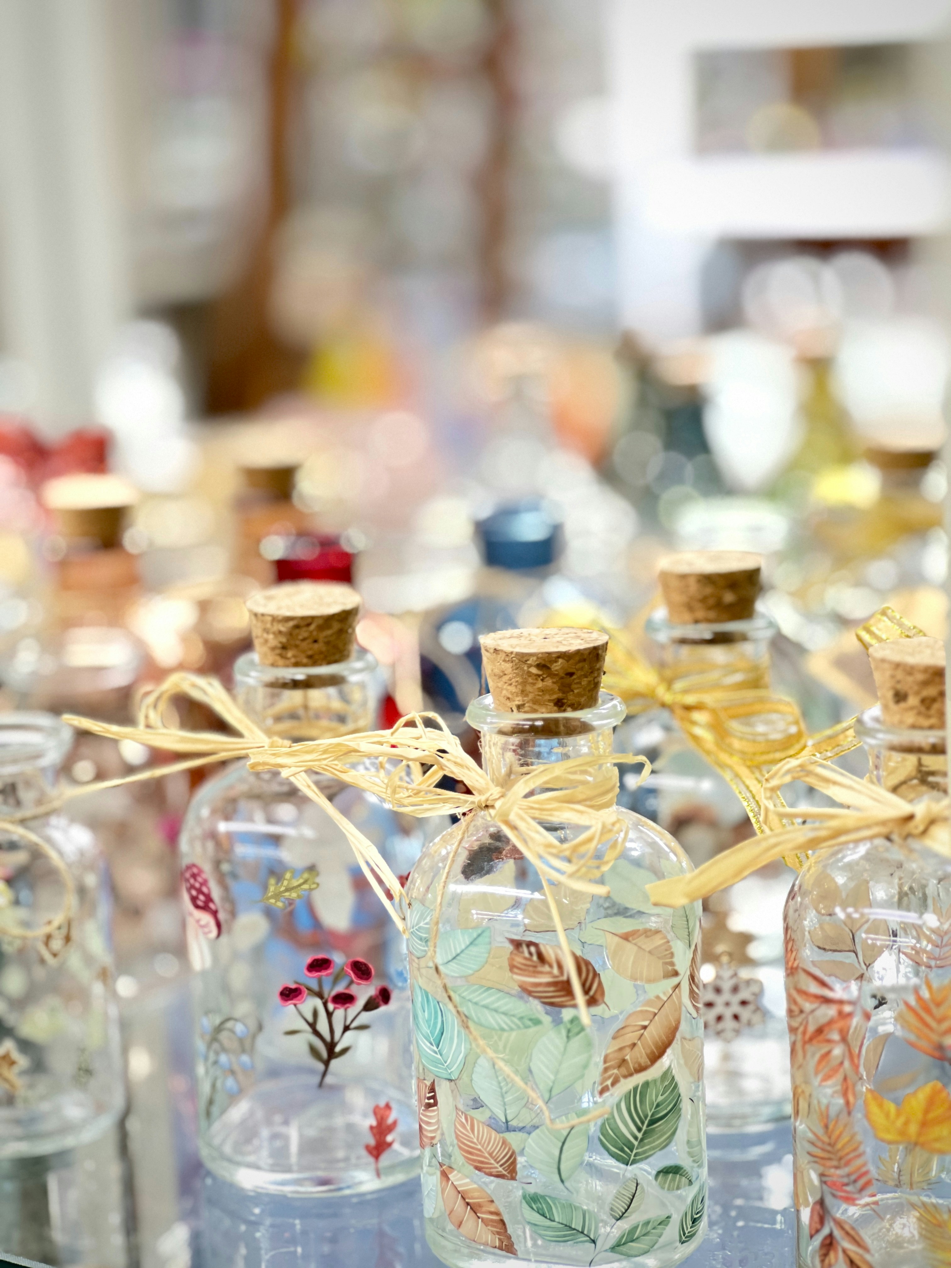 Small decorative glass bottles with cork stoppers
