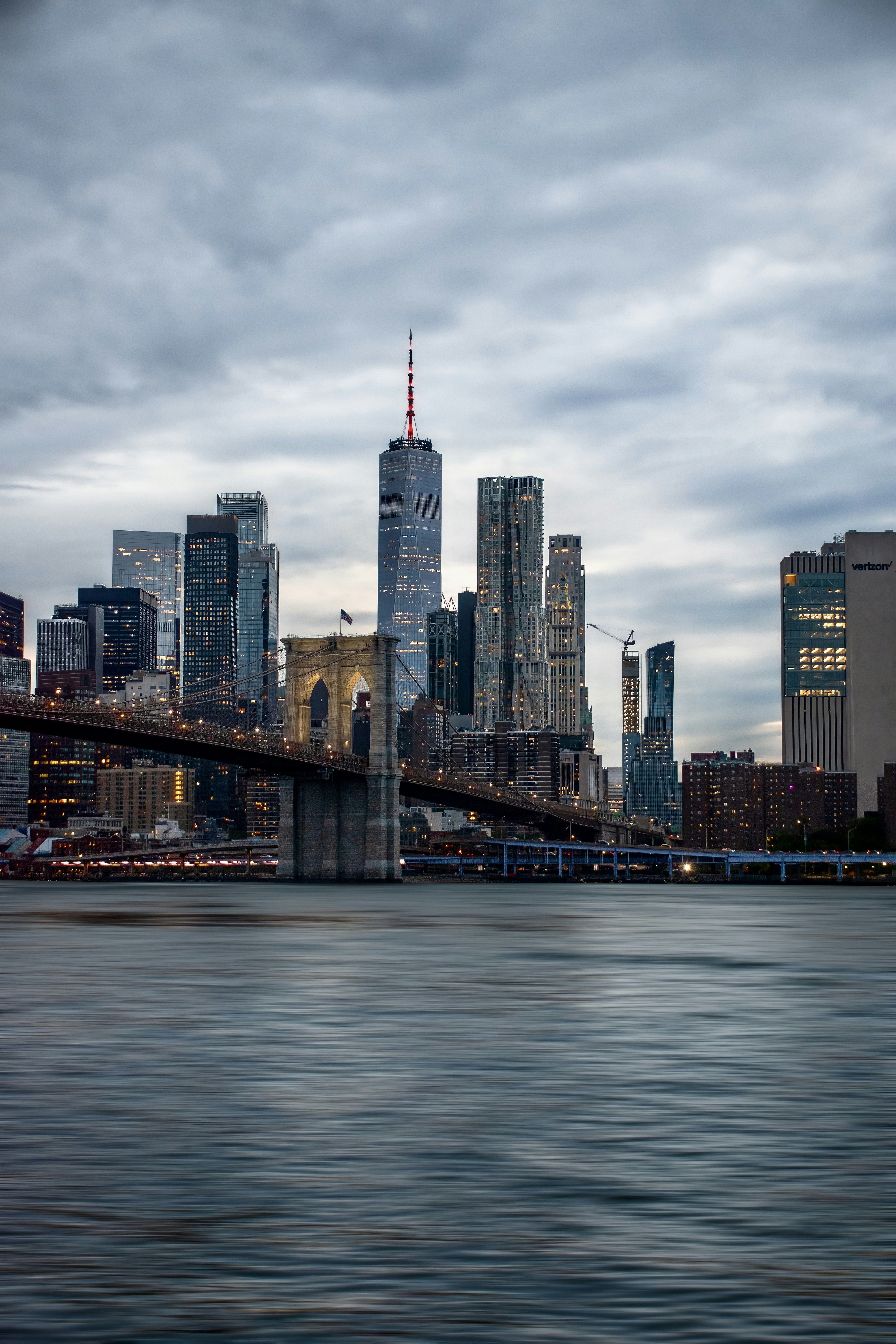 New york city skyline with brooklyn bridge at dusk