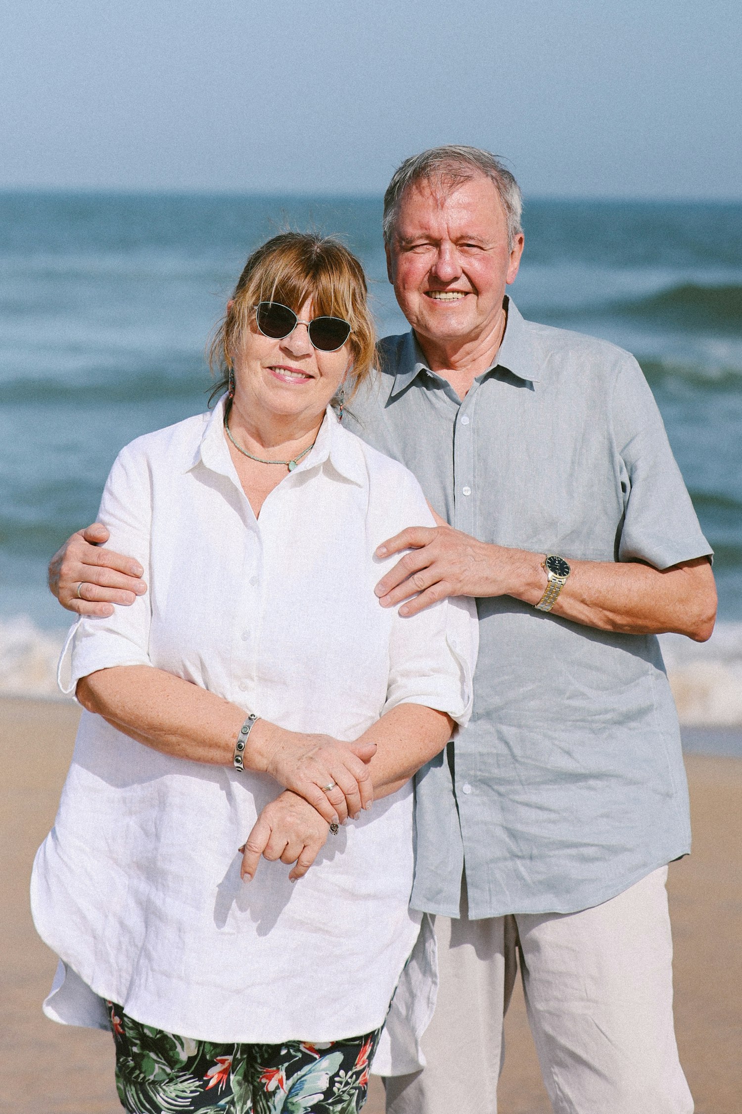 Retired couple walking outdoors and enjoying time together