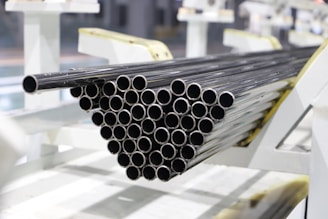 Stack of metal pipes on a factory line