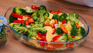 Raw vegetables in a glass baking dish