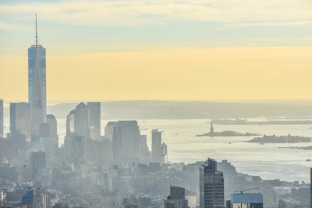New York City skyline with the Statue of Liberty in the distance