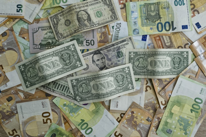 US dollars and euros representing multi-currency travel expenses