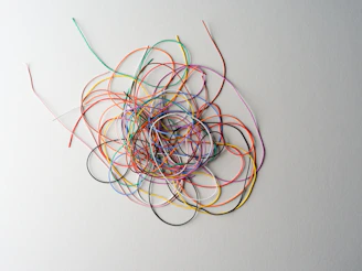 A tangled mess of colorful thin wires.