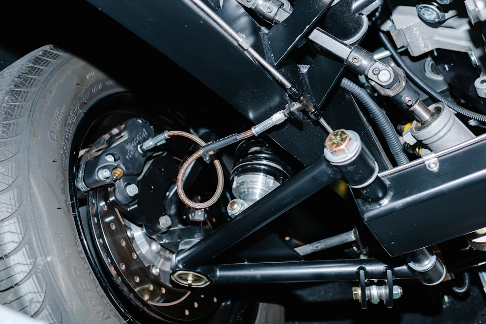 Close-up view of a vintage car's suspension system