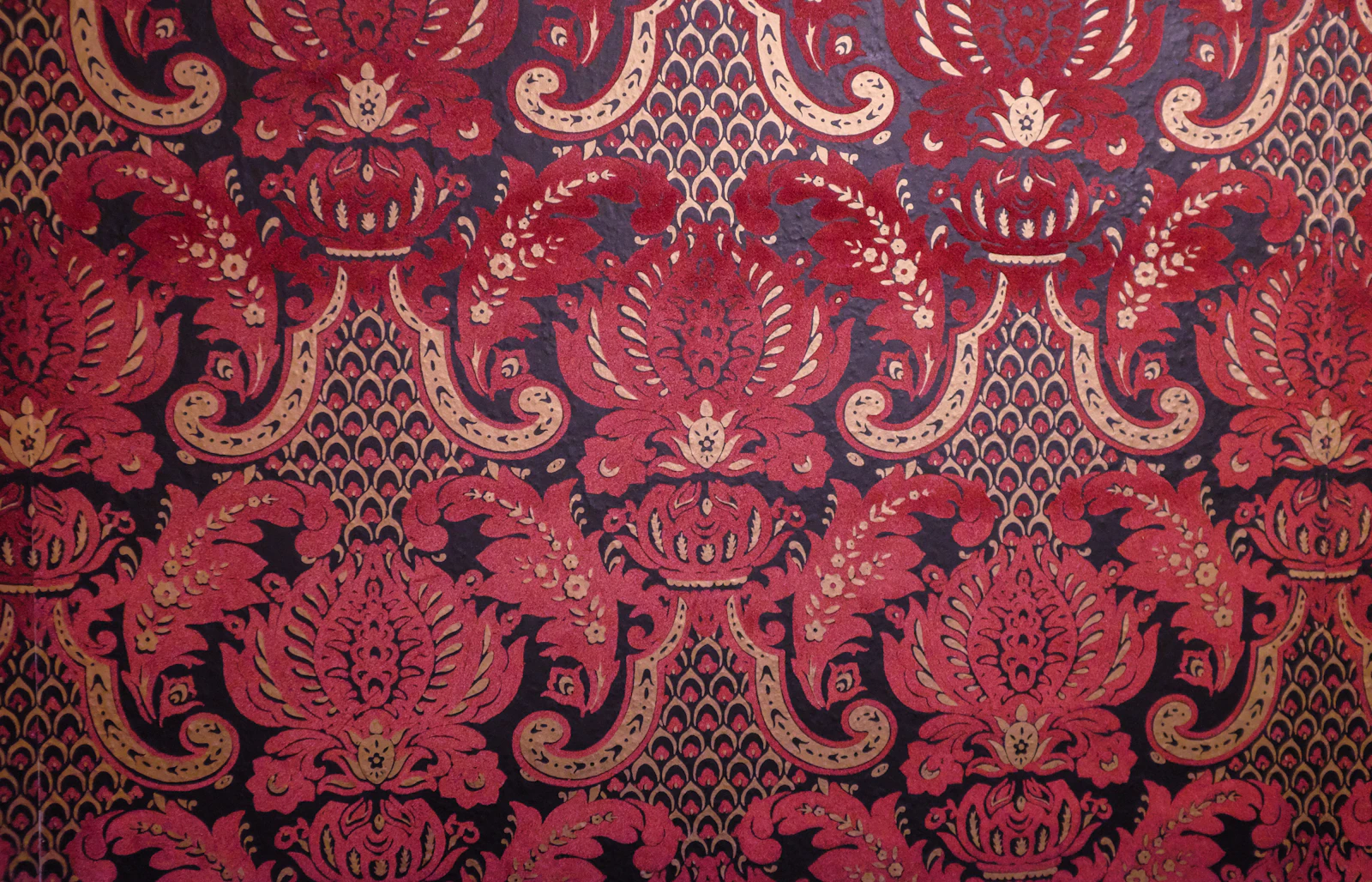 Red and gold paisley brocade used for designer blouse panels