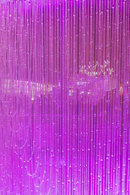 Purple beaded curtain with soft light