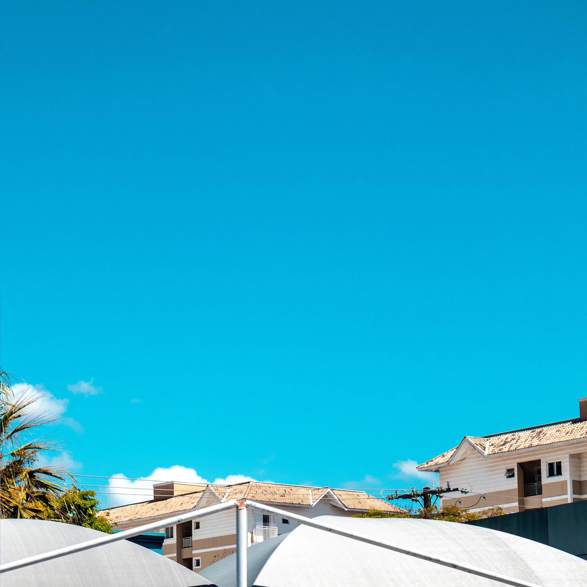 White buildings under a clear blue sky.