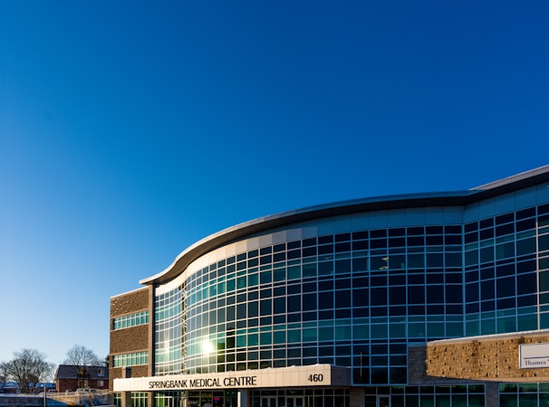 Modern medical center building with a glass facade, similar in scale to the eight-story medical office tower approved for the Las Vegas Medical District