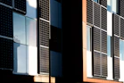 Modern building facade with integrated solar panels