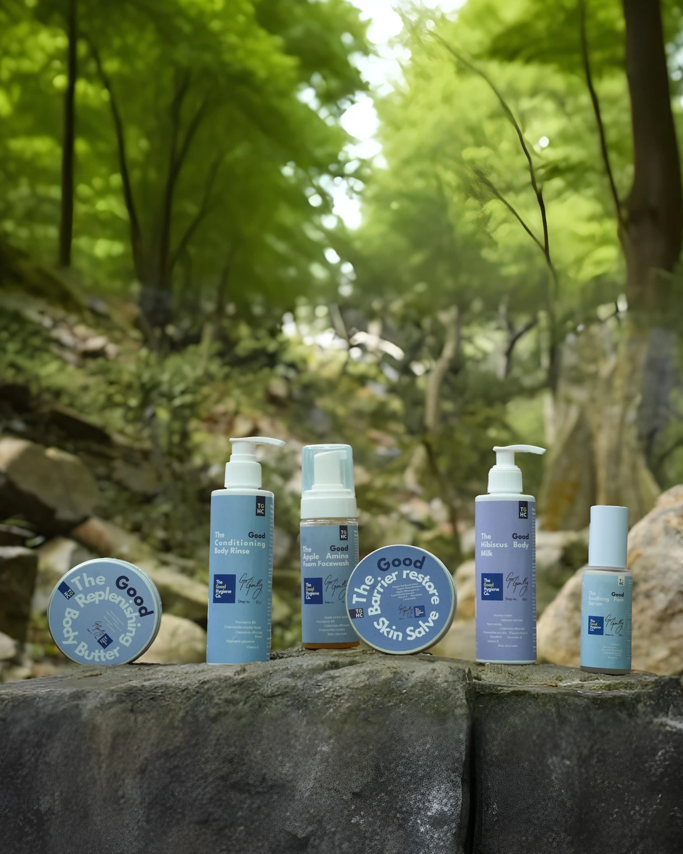 Skincare products on rocks in a forest