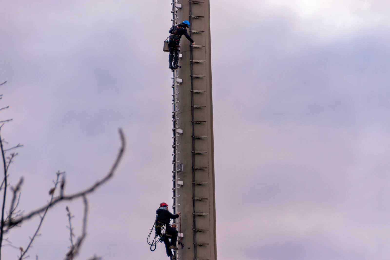 Tower crew climbing a communications tower
