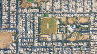 Aerial view of a residential area with a sports field.