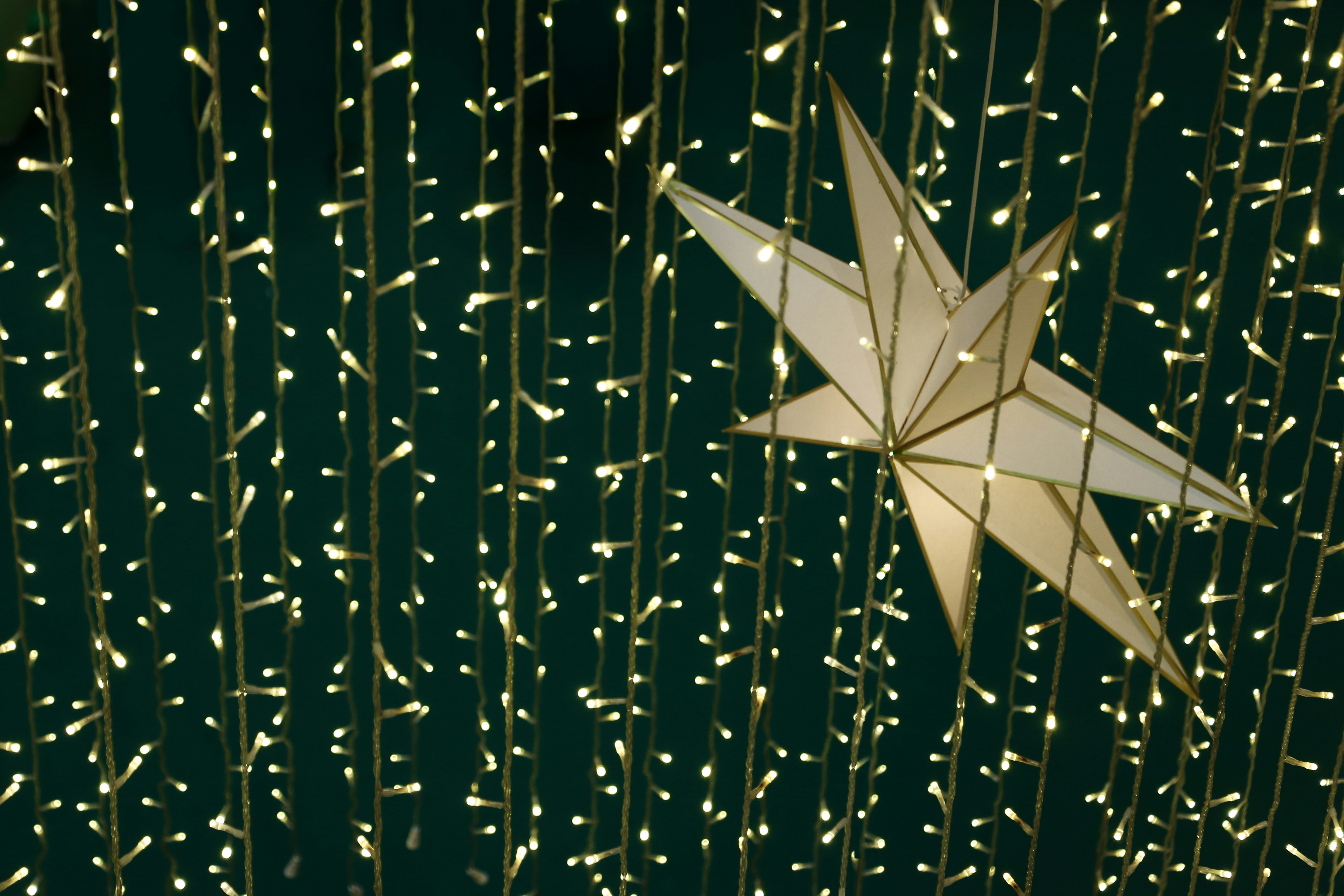 A large star decoration surrounded by small lights.