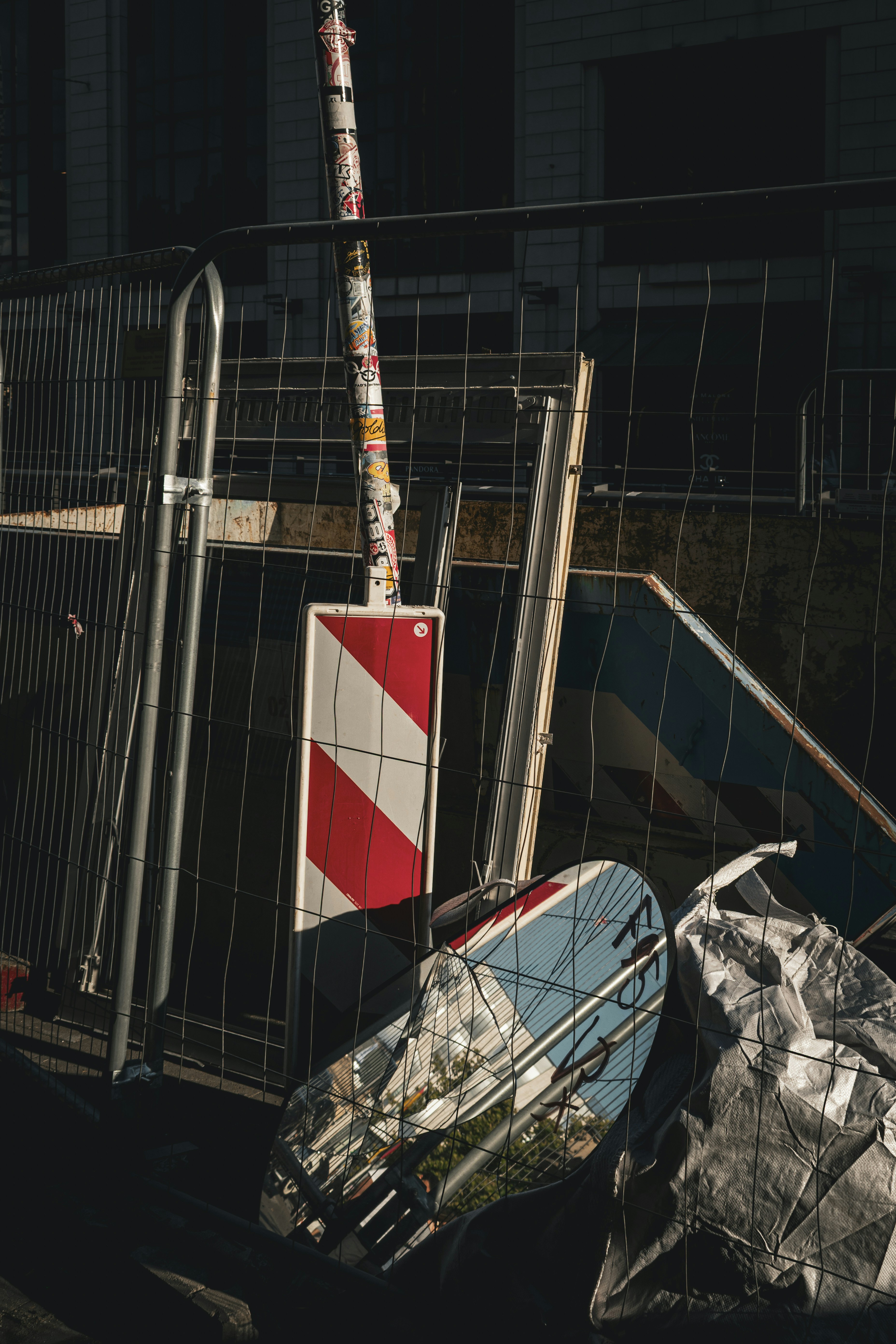 Construction site with signs and debris