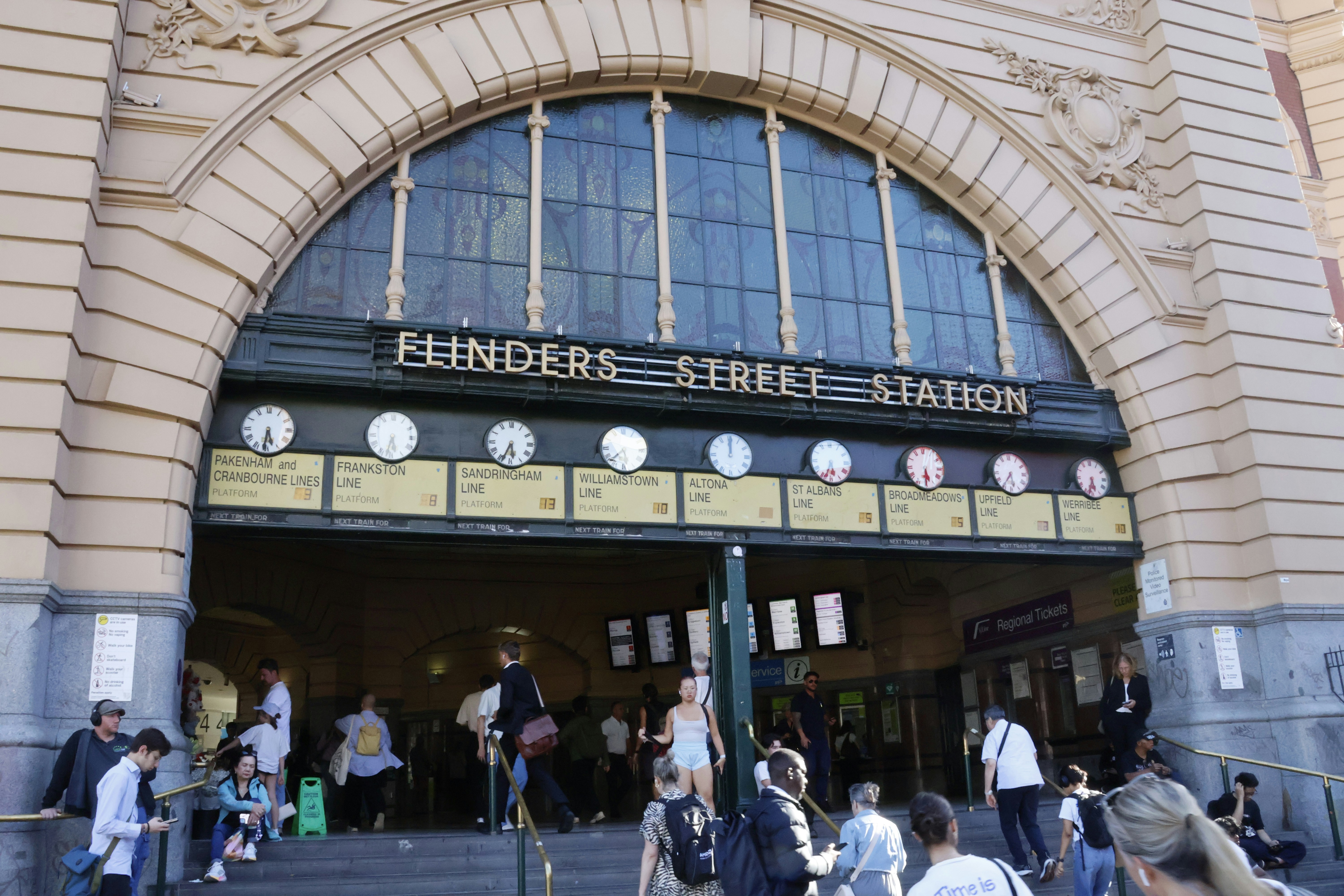Flinders street station entrance with people entering