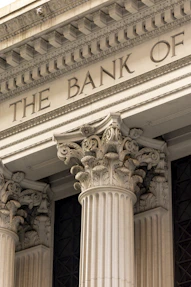 The bank of ornate classical columns and facade