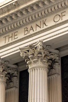 The bank of ornate classical columns and facade