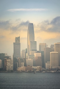 San francisco skyline at sunrise with fog.
